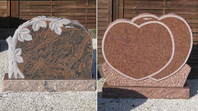 To minde om kærlighed, to gravsten i granit med hjerteform og detaljerede blade, placeret på grusunderlag.